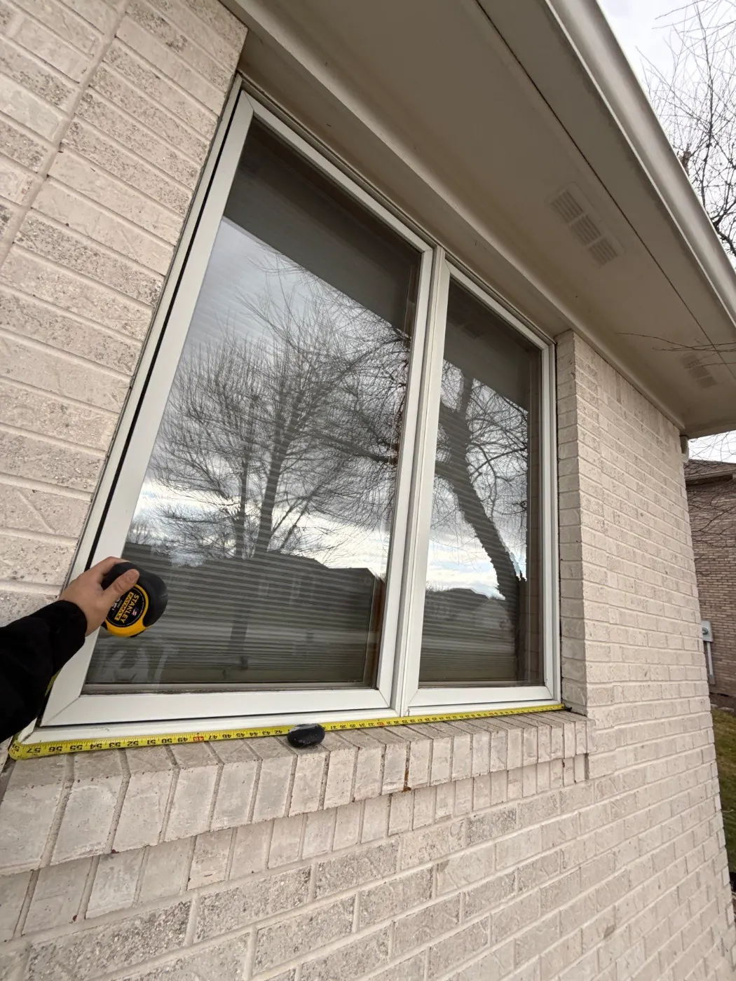 Frame and seal detail on a Noblesville window job